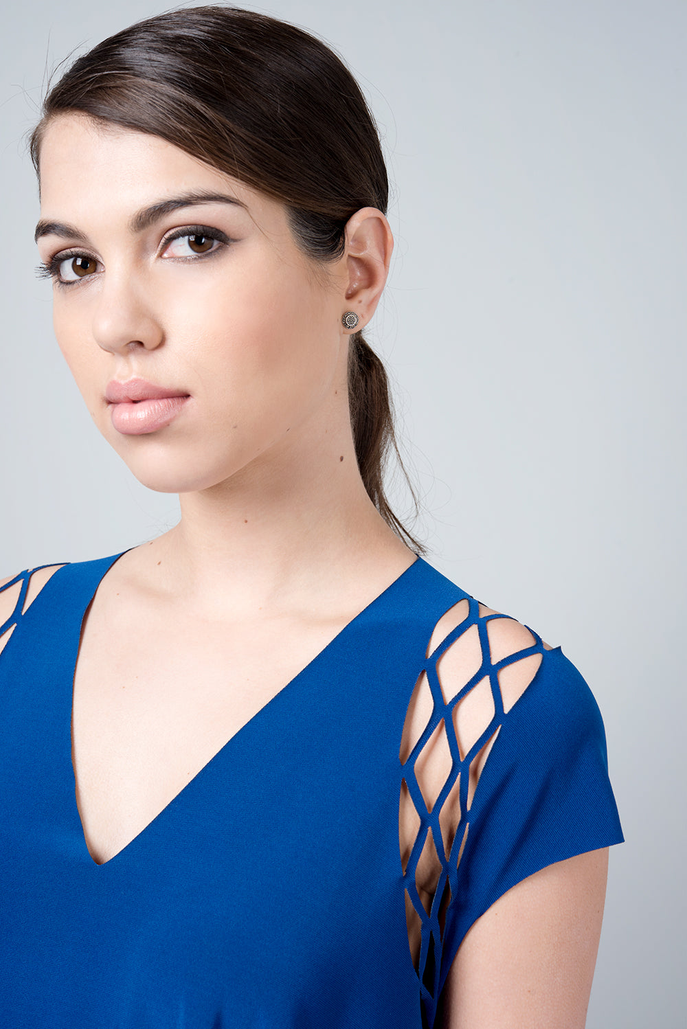 Gamma shirt - a blue shirt with a special cut on the shoulder