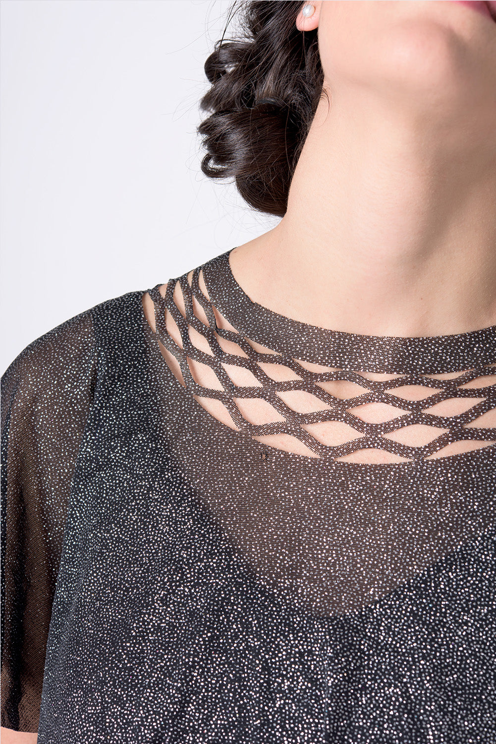 Sparkly top for the event with a chain trim