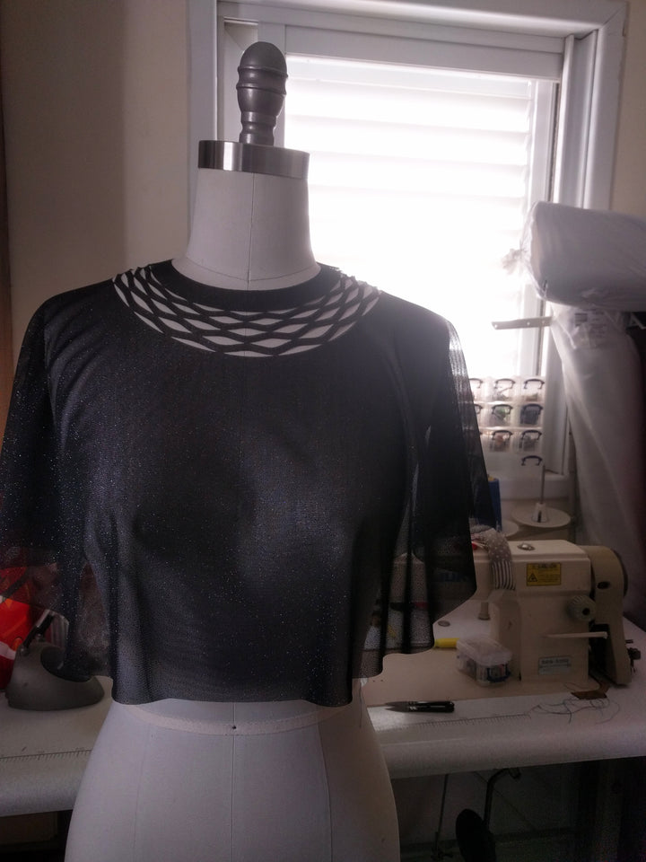 Sparkly top for the event with a chain trim
