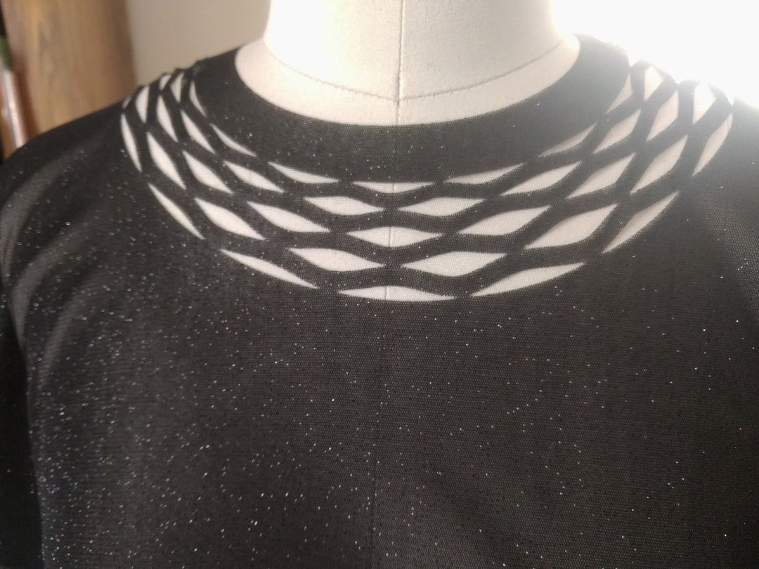 Sparkly top for the event with a chain trim