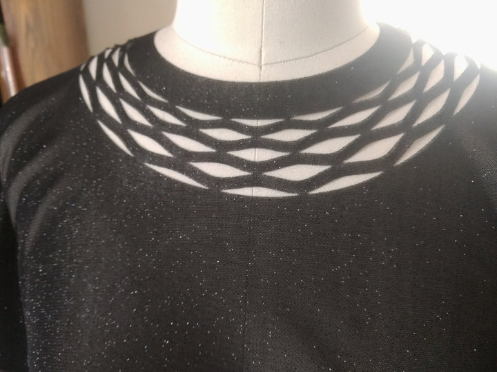 Sparkly top for the event with a chain trim