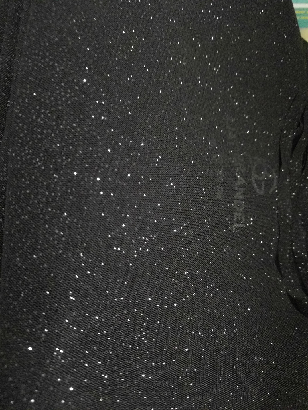 Sparkly top for the event with a chain trim
