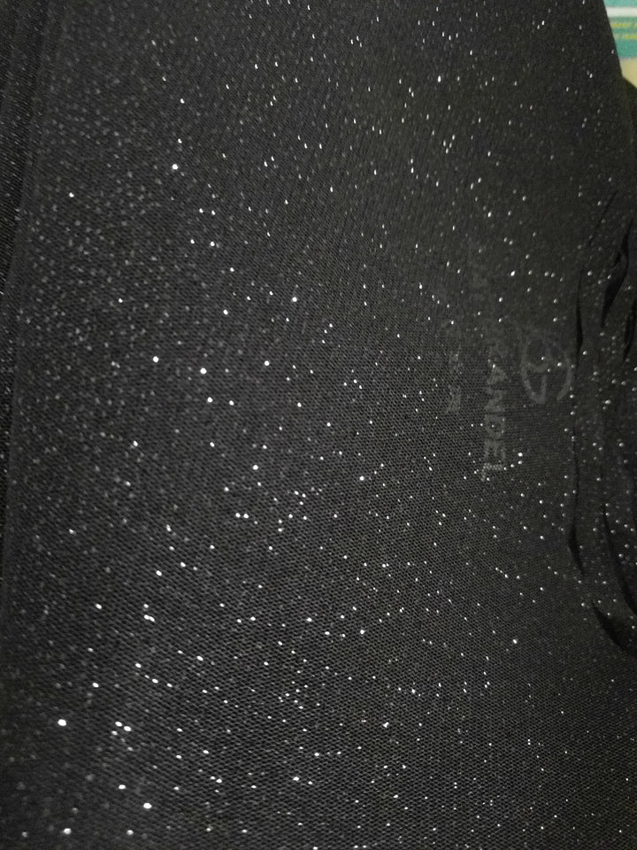 Sparkly top for the event with a chain trim