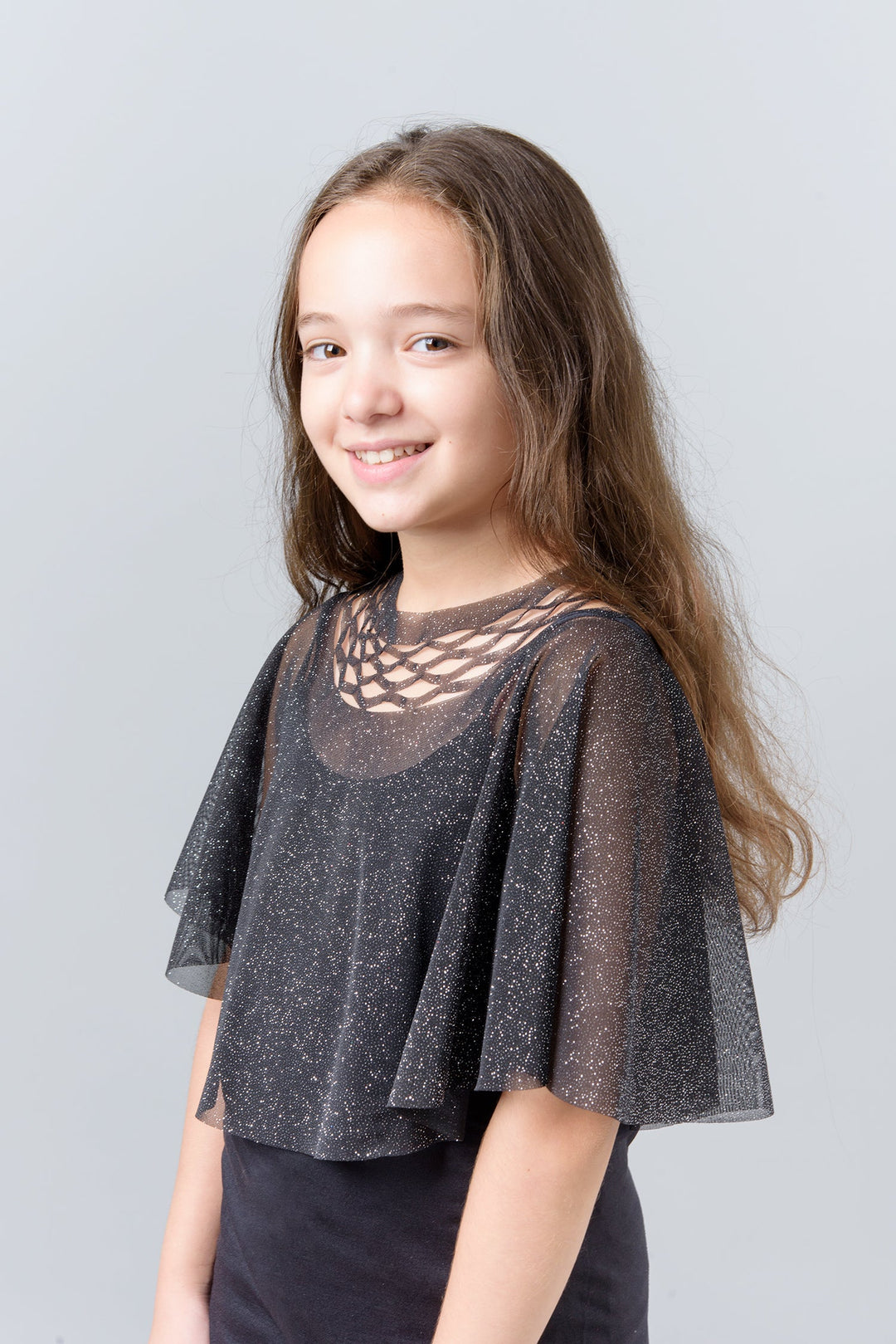 Glittering black top for a girl - a top for a girl for an event with laser cutting