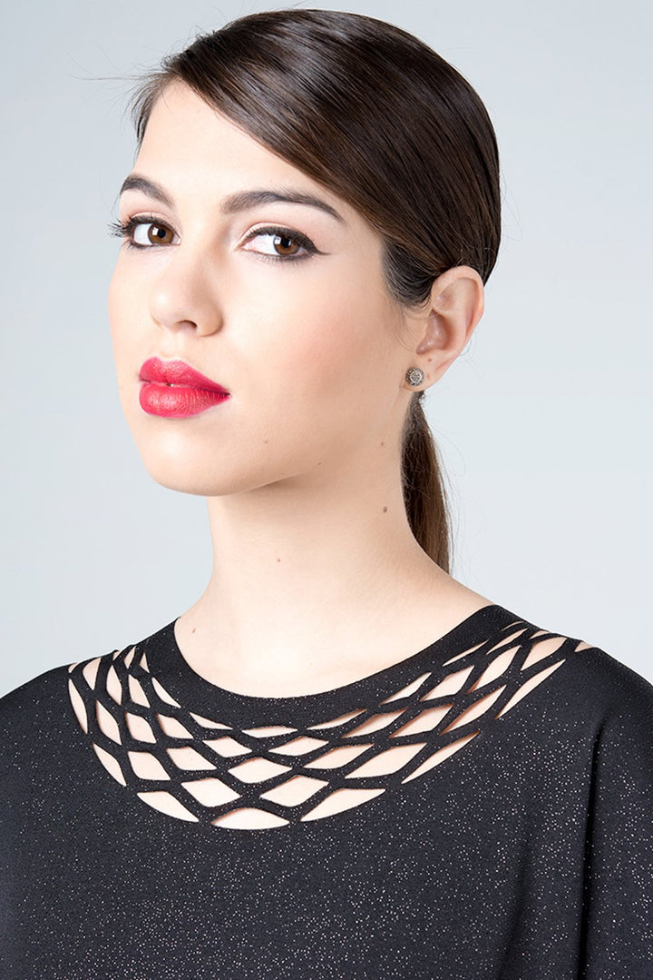 Top for the event - a sparkling black top for the evening with a chain trim