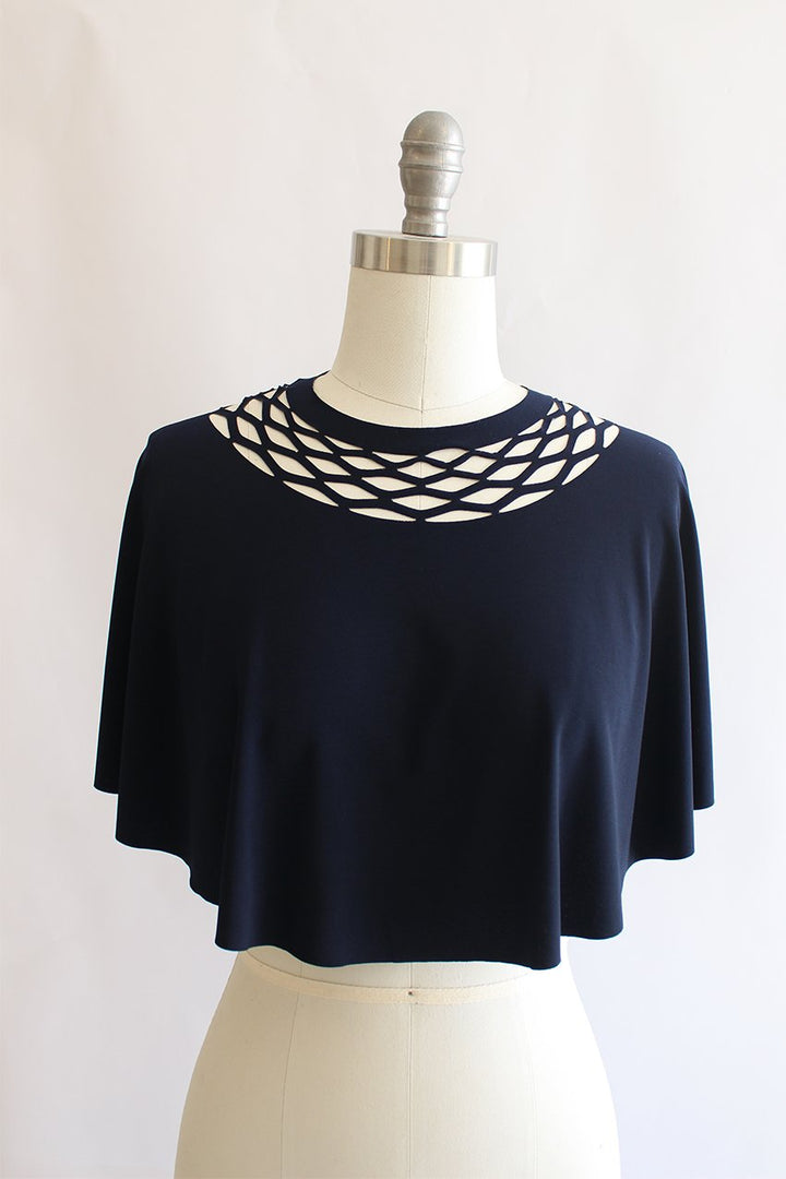 A special top for the event with a chain cut - a navy blue top